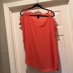 Coral/orange top with cute shoulder detail!